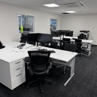 Rayleigh corner desks with 600 deep pedestals, orbit mesh chairs and Aura medium back exeucitve